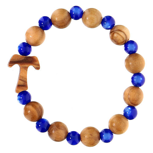 Elastisches Tau-Armband mit Zehner aus Assisi-Holz und mit blauen kleinen Perlen von 1 cm 1