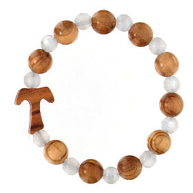 Elastisches Tau-Armband mit Zehner aus Assisi-Holz und mit weißen kleinen Perlen von 1 cm