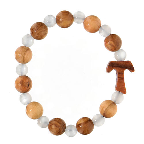 Elastisches Tau-Armband mit Zehner aus Assisi-Holz und mit weißen kleinen Perlen von 1 cm 1