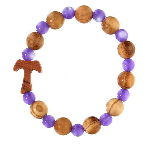 Elastisches Tau-Armband mit Zehner aus Assisi-Holz und mit lila kleinen Perlen von 1 cm 2