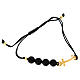 Rope bracelet with golden anchor-shaped cross and onyx beads by Endless s1