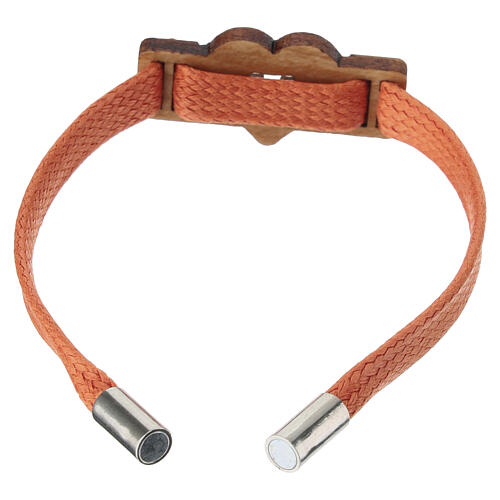 Bracciale artigianale arancione con Tau e cuore Monastero Clarisse 3