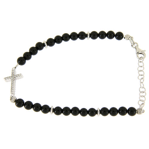 Bracelet with 4,2 mm balls in black shiny onyx, with a white zirconate cross 1