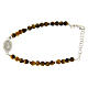 Bracelet with white zirconate medal and tiger's eye beads s1