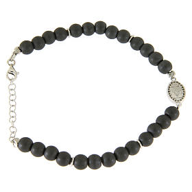 Opaque gray hematite stone bracelet with medal of Saint Rita white zircons
