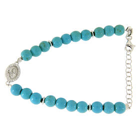 Bracelet with turquoise paste spheres and gold veins with Saint Rita medal and white zircons