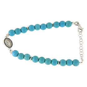 Bracciale sfere pasta di turchese e venature color oro con S. Rita in medaglietta di zirconi neri