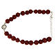 Pulsera piedras lávicas rojas 6,5 mm, pequeña medalla S.Rita zircones negros - plata 925 s1