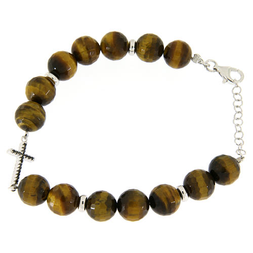 Bracelet with tiger's eye stones sized 9 mm, black zirconate cross and silver details 1