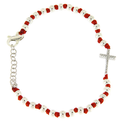 Bracelet with silver spheres sized 3 mm, red cotton knots and white zirconate cross 1