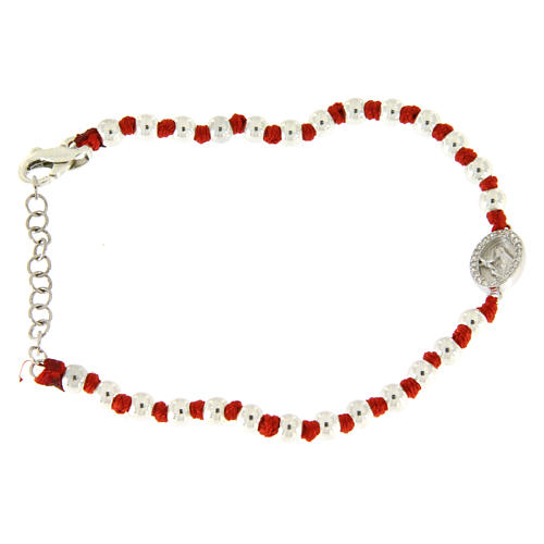 Bracelet with silver spheres sized 3 mm, red cotton knots, Saint Rita medalet and white zirconate cross 1