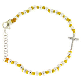 Bracelet with silver spheres sized 3 mm with yellow cotton knots and white zirconate cross