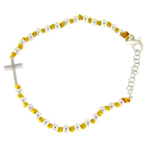Bracelet with silver spheres sized 3 mm with yellow cotton knots and white zirconate cross 1
