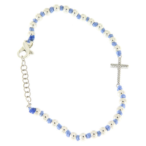 Bracelet with cord and light blue knots with 3 mm spheres and silver and white zirconate cross 1