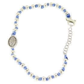 Bracelet médaille Ste Rita argent et zircons blancs grains argent 3 mm et noeuds en coton bleu
