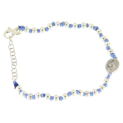 Bracelet with Saint Rita medalet in silver and white zircons, 3 mm spheres and light blue cotton knots 1