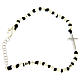 Bracelet with multifaceted silver beads sized 2 mm on a black cotton cord and a white zirconate cross s2