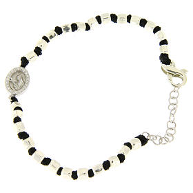 Bracelet with multifaceted silver beads sized 2 mm on a black cotton cord and a black zirconate Saint Rita medalet