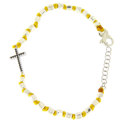 Bracelet with multifaceted spheres sized 2 mm with black zirconate cross and yellow cotton cord 2