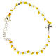 Bracelet with multifaceted spheres sized 2 mm with black zirconate cross and yellow cotton cord s1