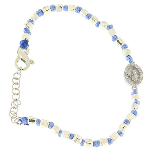 Bracelet with 2 mm multifaceted beads in silver, light blue cord and Saint Rita medal with white zircons 1