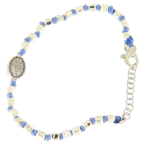 Bracelet with 2 mm multifaceted beads in silver, light blue cord and Saint Rita medal with white zircons 2
