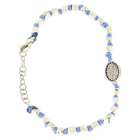 Pulsera esferas talladas plata 2 mm, cuerda con nudos azul, pequeña medalla S. Rita zircones negros