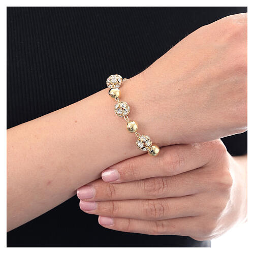 Gold plated bracelet with white strass balls and shiny beads of 925 silver 2