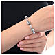 Single decade rosary bracelet of strass ball beads and white faceted crystals, 925 silver s2