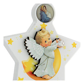 Above crib white star with angel