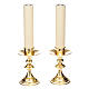 pair of lucid brass candle holders s1