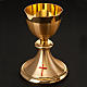 Golden chalice and ciborium with cross s3
