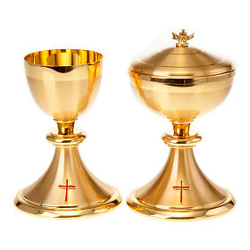 Golden chalice and ciborium with cross