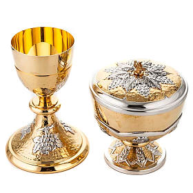Chalice and ciborium Grapes and spikes, chiseled brass
