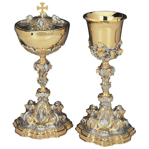 Chalice and Ciborium with evangelistic symbols and angels in sil 1