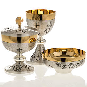Chalice, ciborium and paten with ears of wheat, crosses and grap