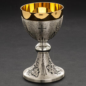 Chalice, ciborium and paten with ears of wheat, crosses and grap