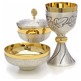 Chalice, ciborium and paten with grapes, ears of wheat and cross