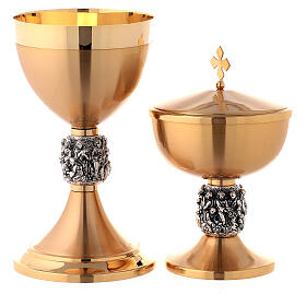 Chalice, ciborium and paten with Miracles relief on node