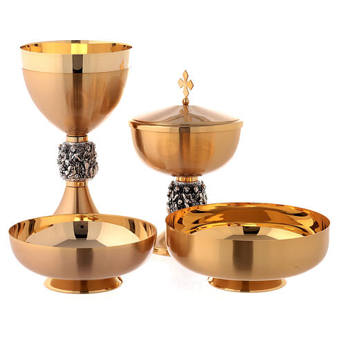 Chalice, ciborium and paten with Miracles relief on node 1