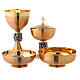 Chalice, ciborium and paten with Miracles relief on node s1