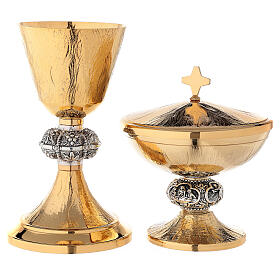 Chalice and ciborium with gold crosses and brunches of grapes