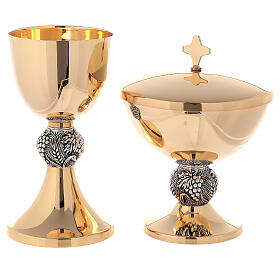 Chalice and ciborium with grapes and ears of weat, silver node