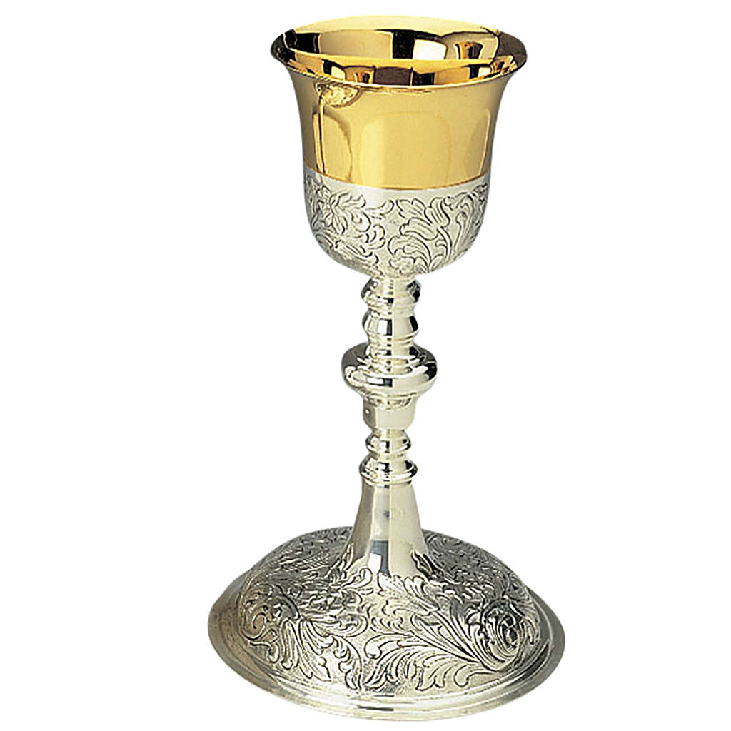 Chalice in hammered and chiselled brass, cup in sterling silver ...