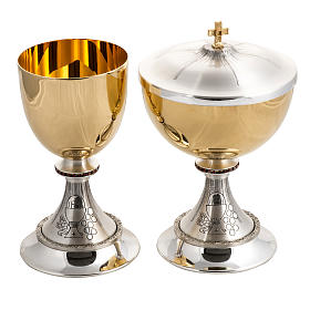 Chalice H13,5 and ciborium H16 in brass with Communion symbols