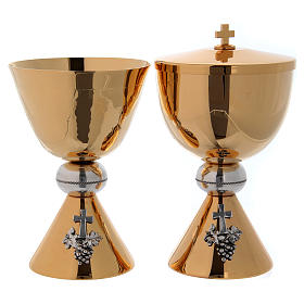Chalice and ciborium in hammered brass, grapes and cross on base