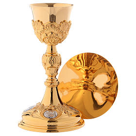 Chalice paten and ciborium in Baroque style with Evangelists medallions in gold brass