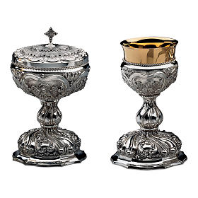 Chalice, paten and ciborium Molina in Baroque style with repoussage in golden brass