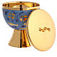 Chalice, paten and ciborium Molina contemporary style with bread and fish on blue background in golden brass s3