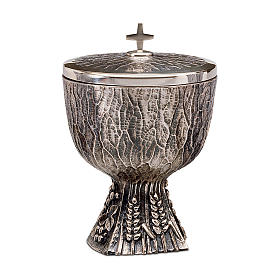 Molina ciborium with design of grapes and vine leaves in relief in silver brass
